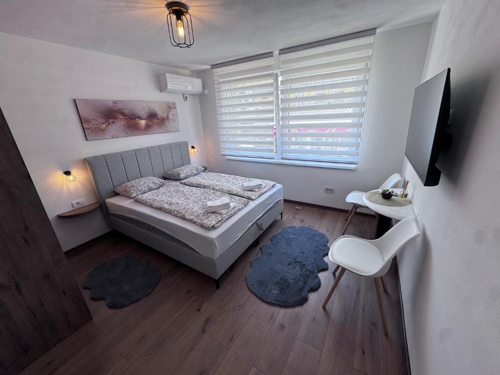 V Apartmani 1 - 4