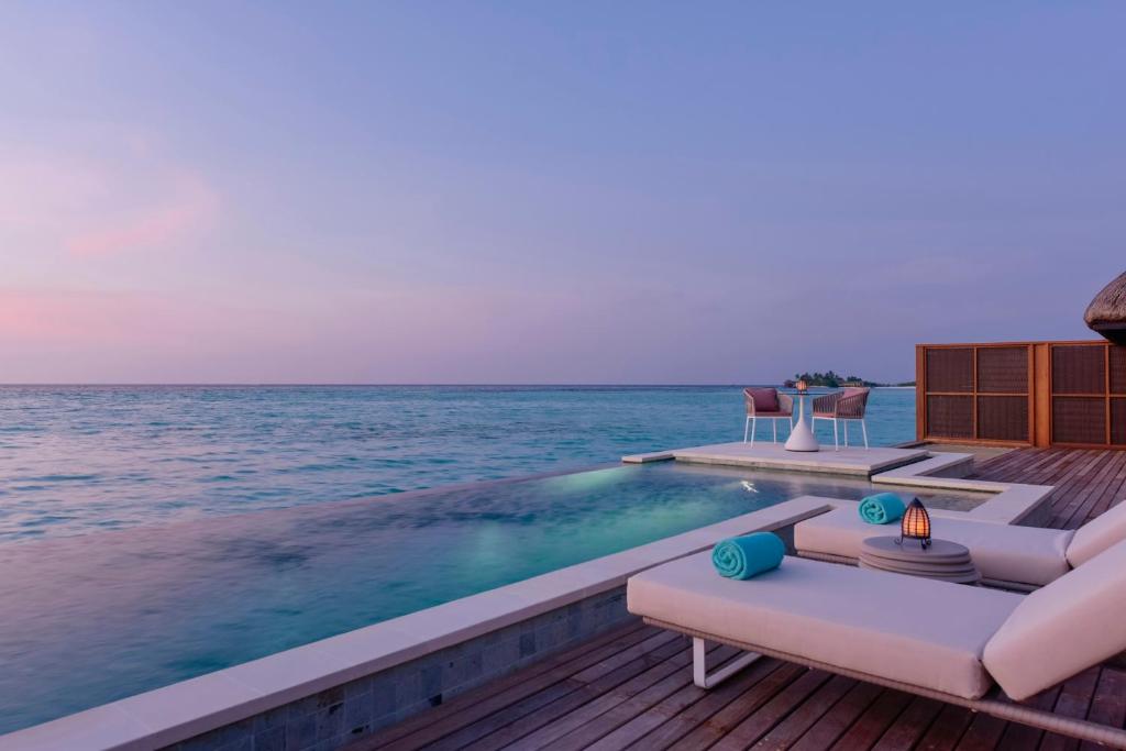 Four Seasons Resort Maldives at Kuda Huraa — Swimming pool in Kaafu Atoll, Kaafu