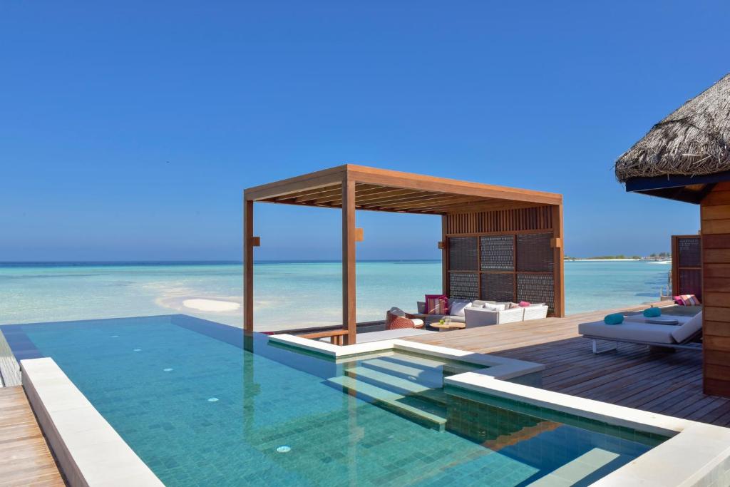 Four Seasons Resort Maldives at Kuda Huraa — Swimming pool in Kaafu Atoll, Kaafu