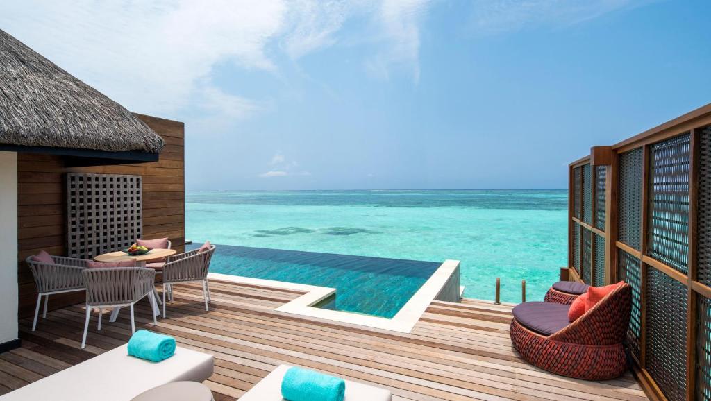 Four Seasons Resort Maldives at Kuda Huraa — Swimming pool in Kaafu Atoll, Kaafu
