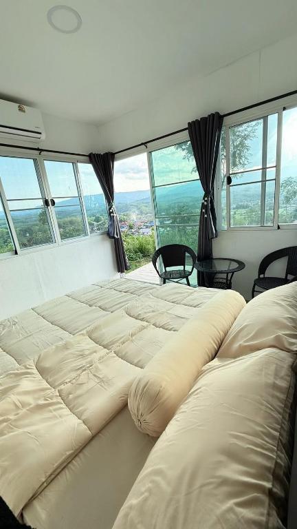 ภูโอบตะวันรีสอร์ต - Phu Oab Tawan Resort, Nan