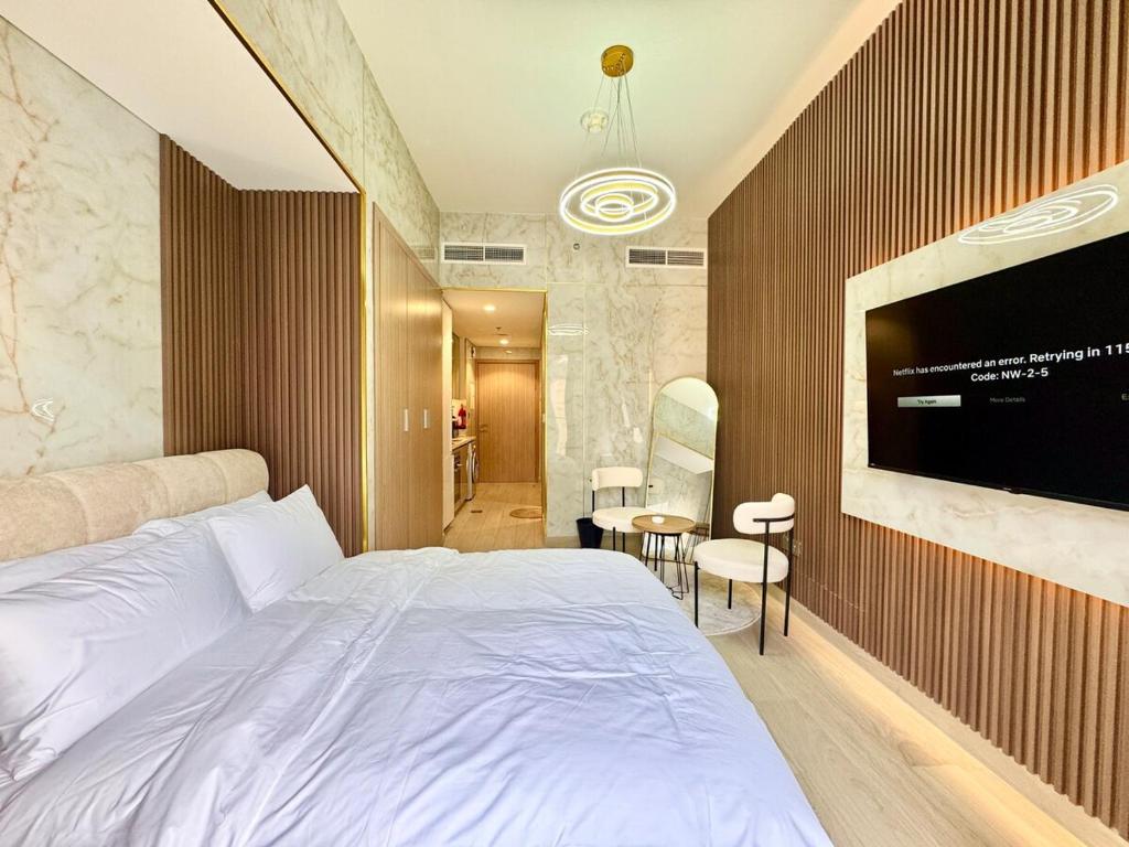 Homes2Retreat - Chic Riviera Studio in Meydan, Dubái