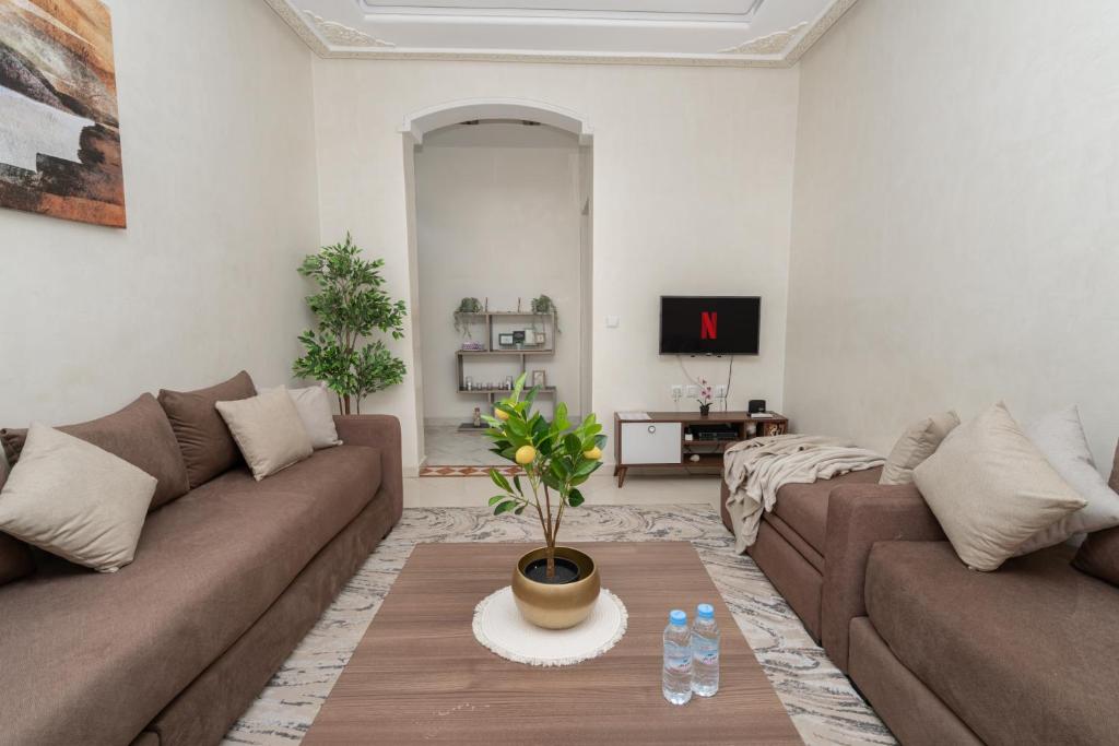 Iris Plage - 2 Chambres Cosy - Malabata, Face mer, Tout à proximité, Playstation - WIFI, AC, IPTV, Tanger