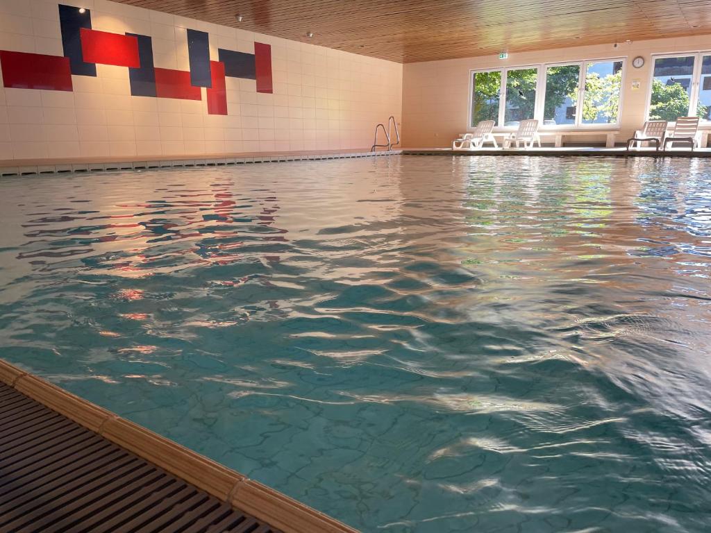 Familienauszeit mit Indoorpool, Sauna, Netflix, Disney, 50-100 MBit Internet inkl Bettwäsche Handtücher Reinigung, Missen-Wilhams