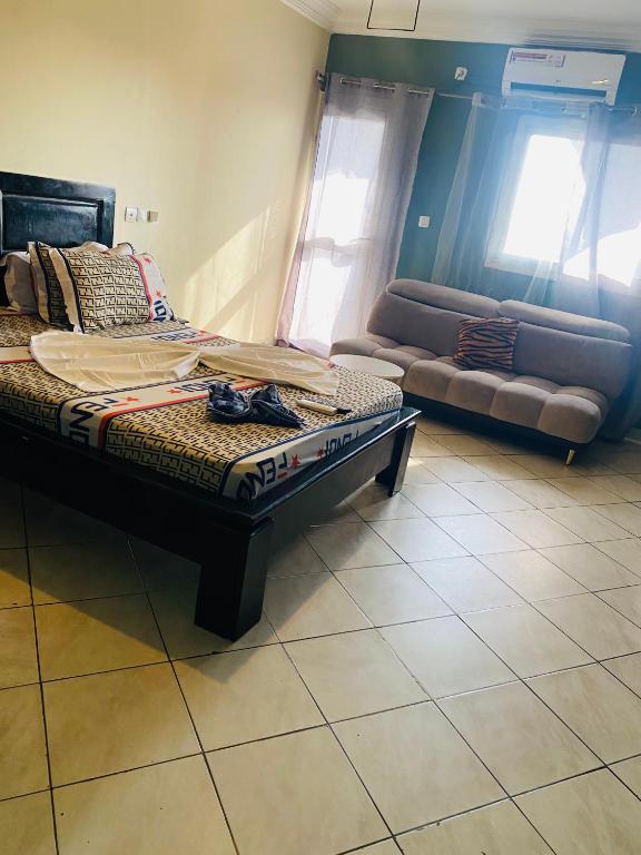 Chambre meublée Rome 2 avec cuisine et wifi, Douala