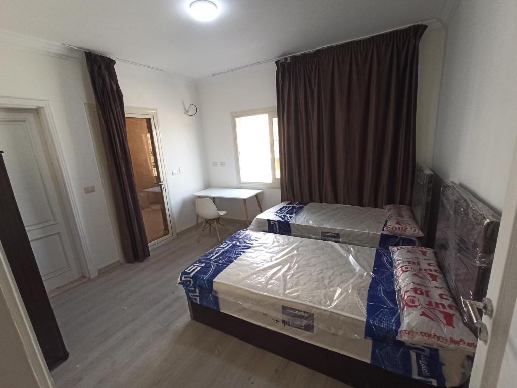 غرف فندقية بجوار الجامعةالاوربية و الكندية والالمانية بكمبوند المقصد العاصمة الادارية, Kafr ash Sharā‘inah