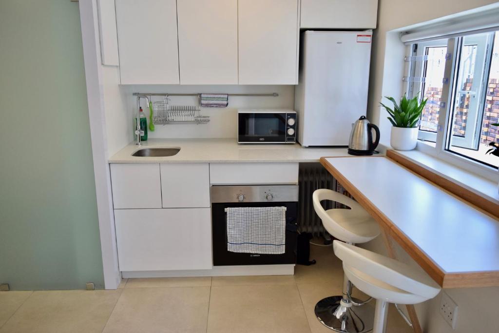 Bright and Adorable Studio in Vredehoek, Kapské Město