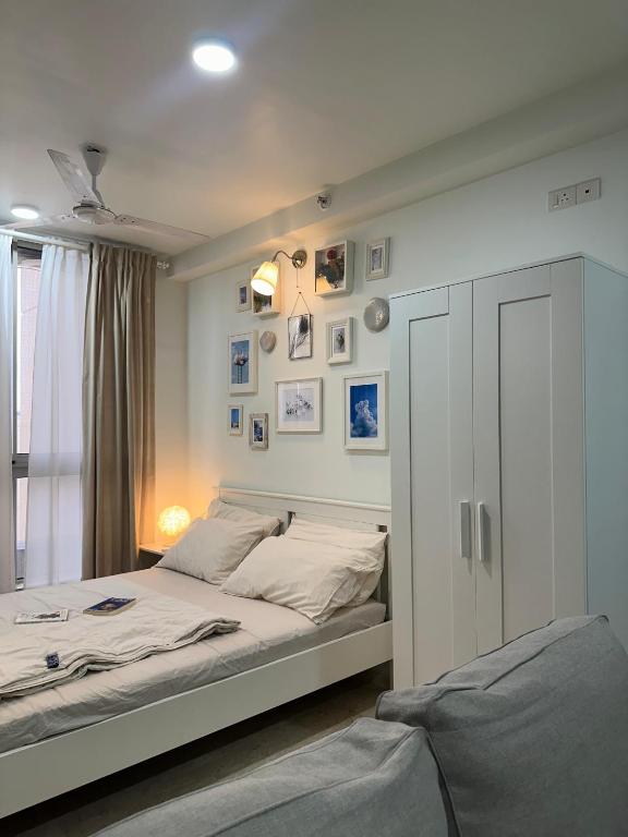 Thane Apartment, Tháné