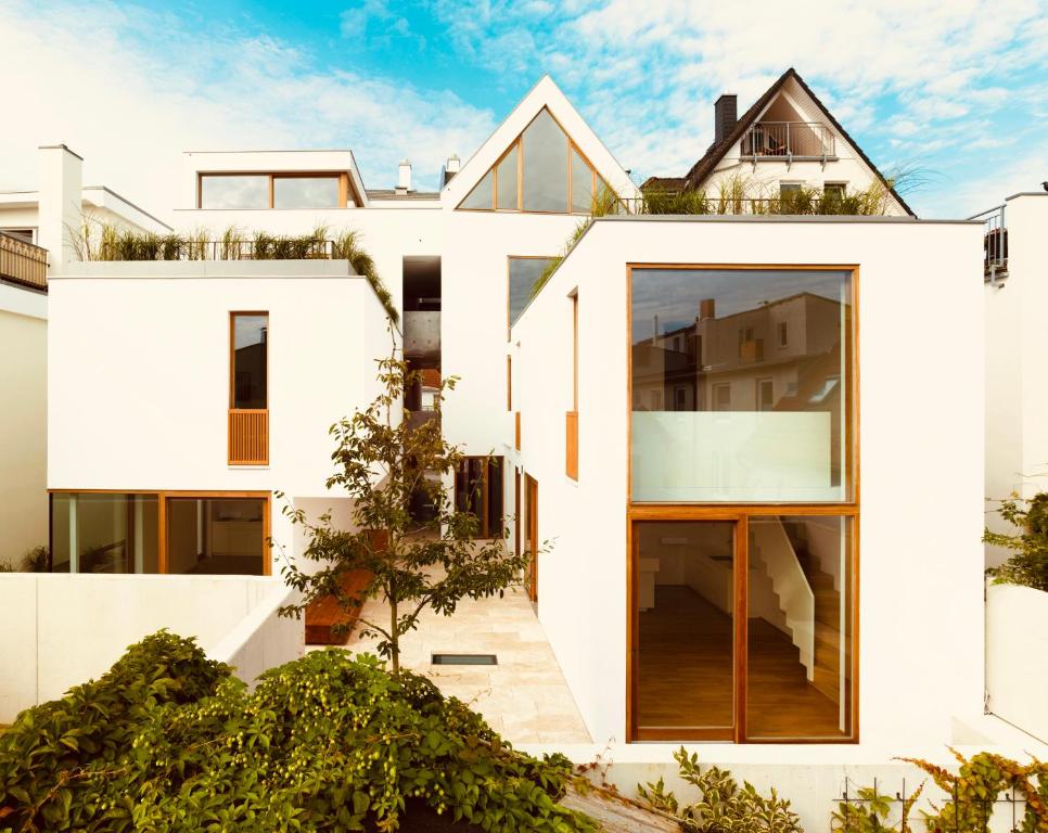 Friedrich und Franz by FeWoZauber, 8 Pers, Zentral, 250m Strand, Tiefgarage, Design Architektur, Rostock