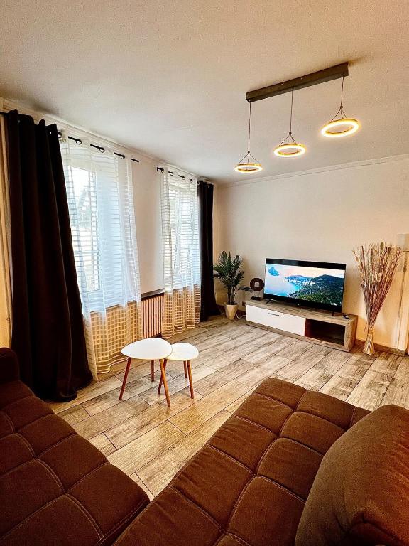 Superbe 57 appartement 2, Manom