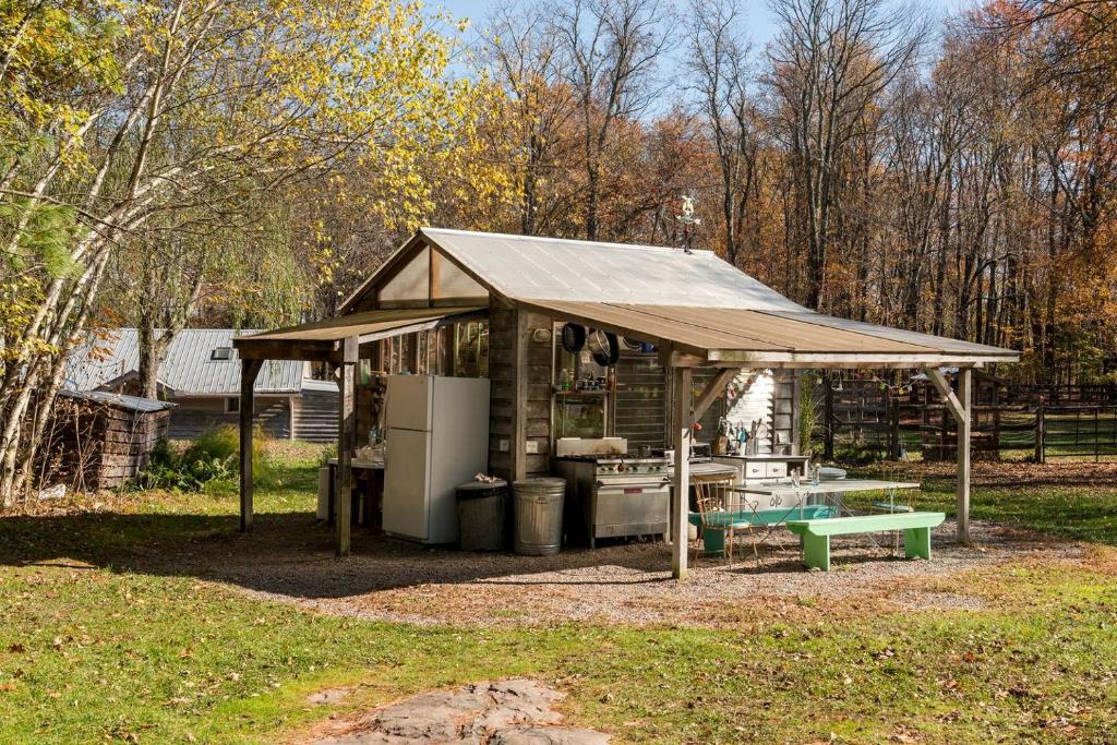 Gorgeous Fully Restored Caravan Nestled in the Trees Along Silver Lake for a Unique Vacation in Woodridge, New York, Woodridge