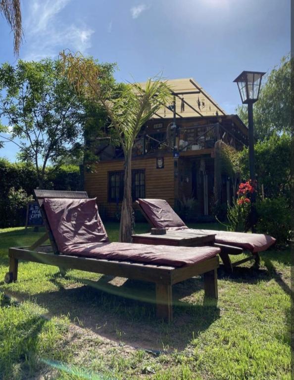 Pura vida quinta parador의 야외 수영장과 푸른 정원