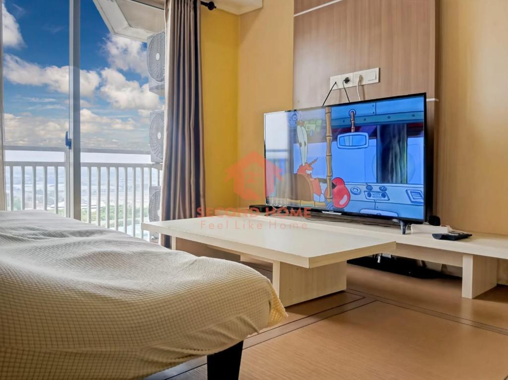 Cozy 2BR Trivium Apt pool & wifi, Jatirarangan