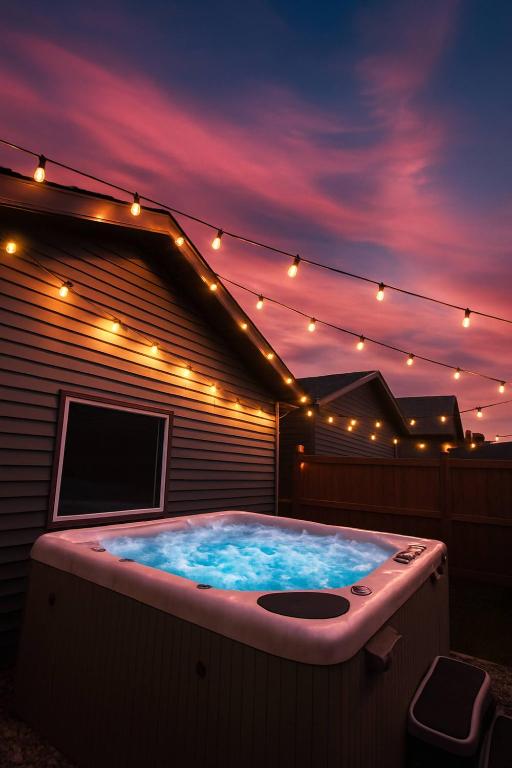 NEW Restful Retreat with Hot Tub, King Bed, AC, Garage, Near WEM, Edmonton