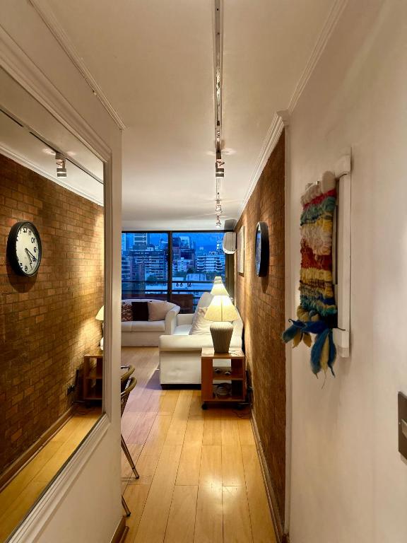 Excellent location and views Spacious 1 bedroom apartment with a sofa bed just steps from Costanera Center it features air conditioning and Wi-Fi and is situated between the El Golf and Tobalaba metro stations Free parking included - 2