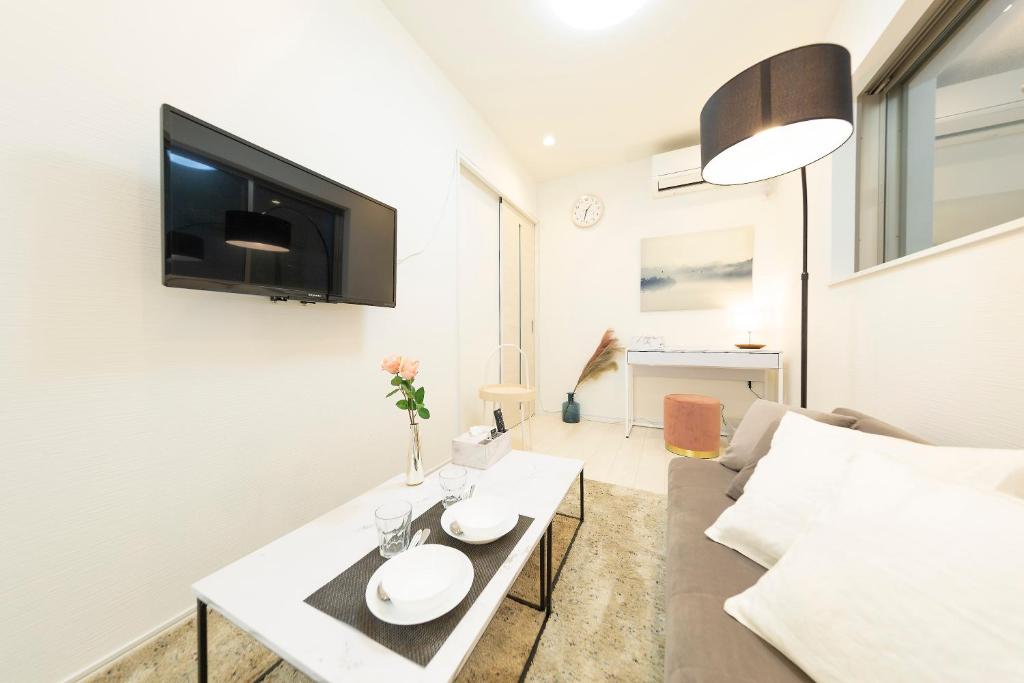 4 minutes by train to Namba 9 min walk to Sta, Osaka