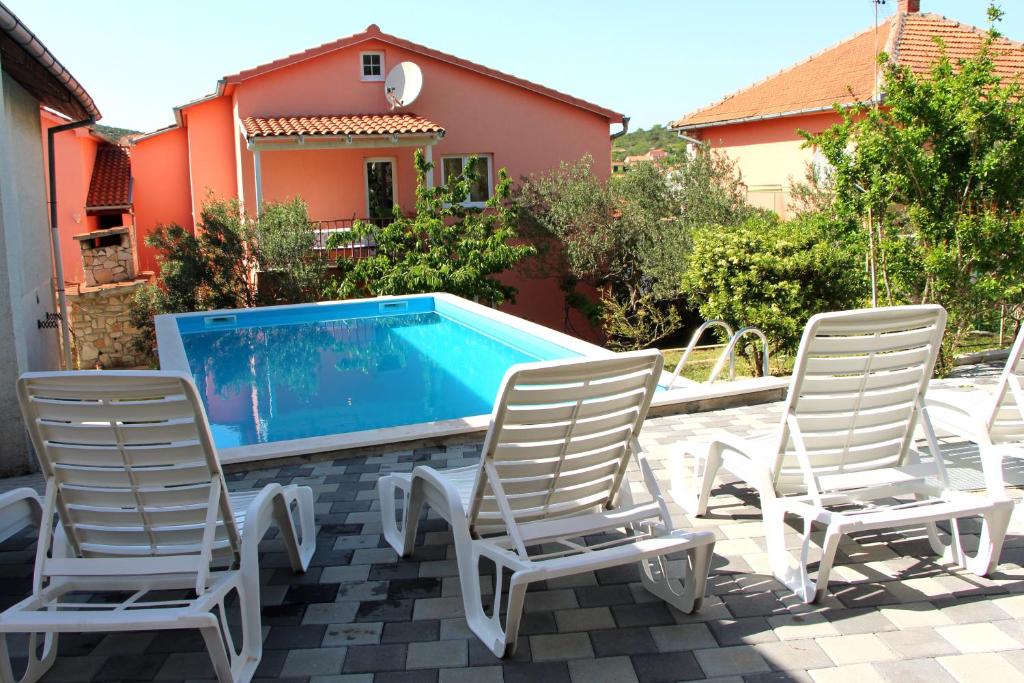 House with outdoor pool in Tisno, Tisno