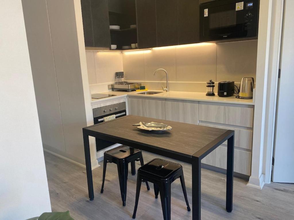 Moderno depto para 2, junto a metro plaza Egaña - 5