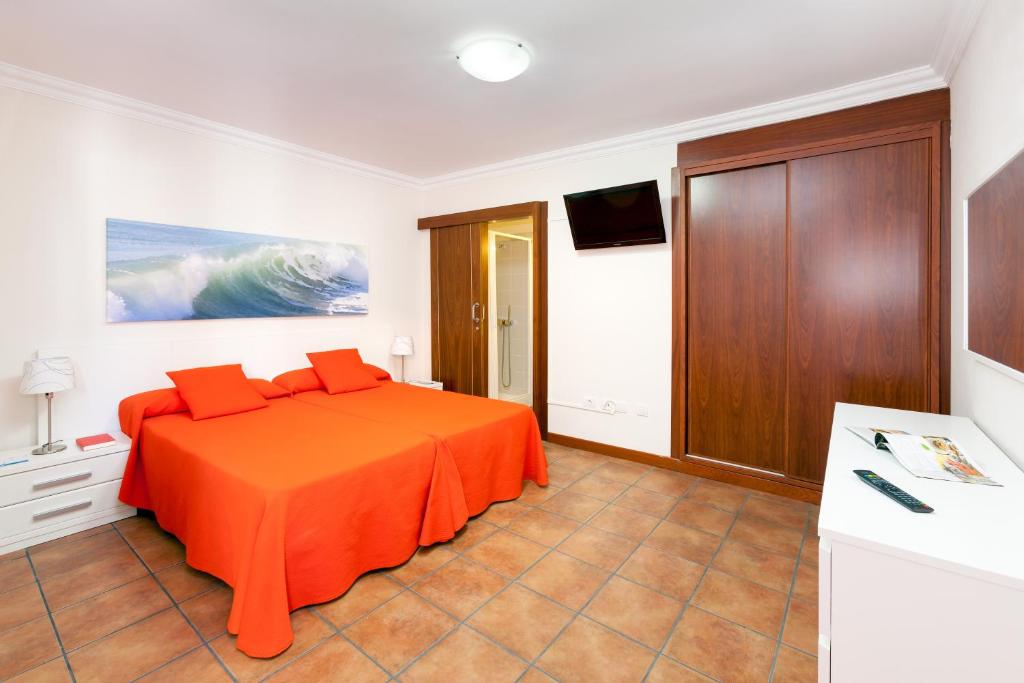 Apartamentos Terrazas Los Gigantes by Suncanarias — Hotel rooms in Acantilado de los Gigantes, Canary Islands