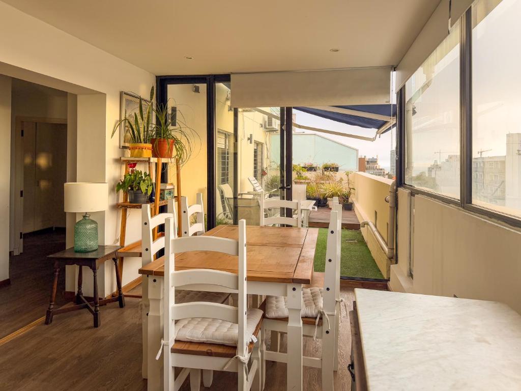 Penthouse con parrillero, terraza y estufa a leña - 4