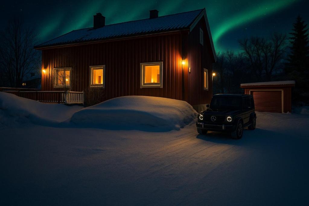 House in the lights and Aurora, Tromsø