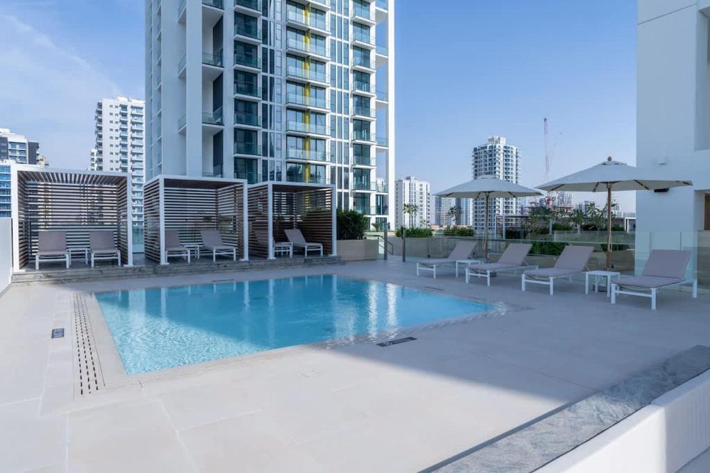 Warm Modern 2BR Retreat with Private Pool in JVC!, Dubái