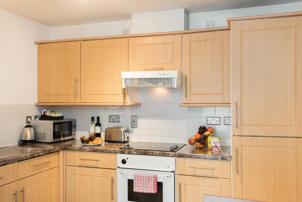 Kitchen, PREMIER SUITES Birmingham in Birmingham
