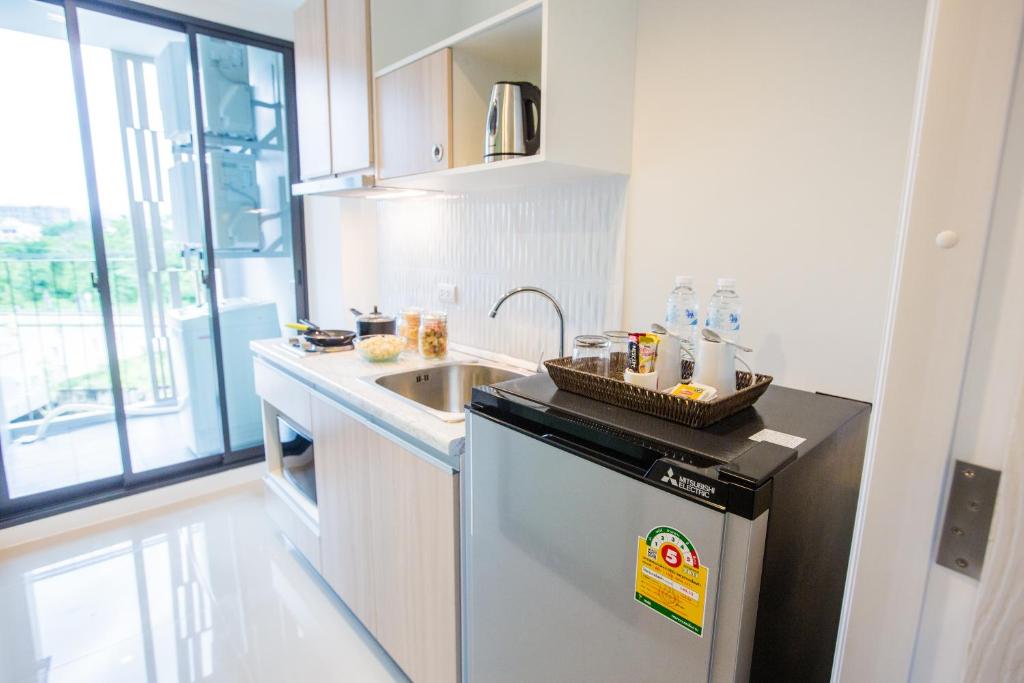 Kitchen, Connext Residence Phuket in Phuket