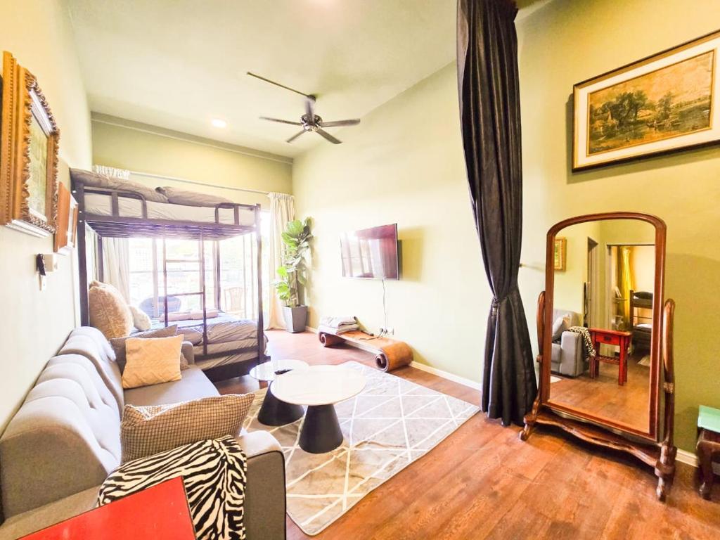 Shared lounge/TV area, Mossy Forest Family Retreat, Kea Farm Brinchang  in Cameron Highlands