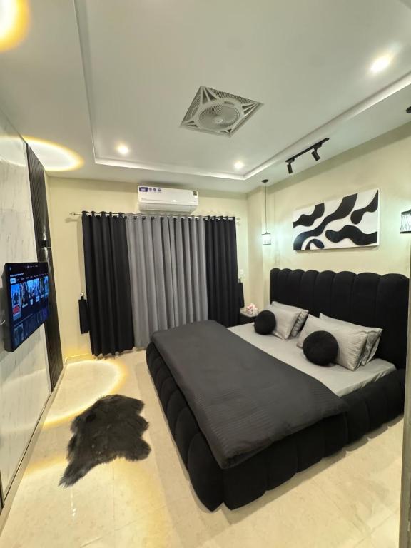 Oro Stays Modern 1BR Self check in, Netflix, Smart lock, Rávalpindí