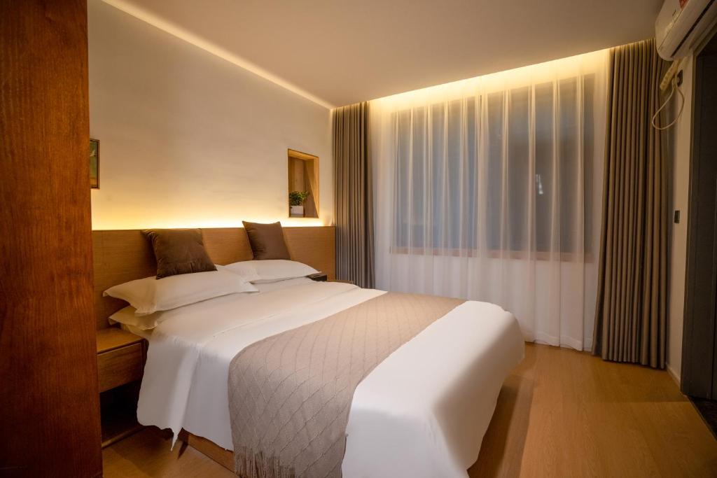 Junlan Hotel 张家界郡澜民宿, Čang-ťia-ťie