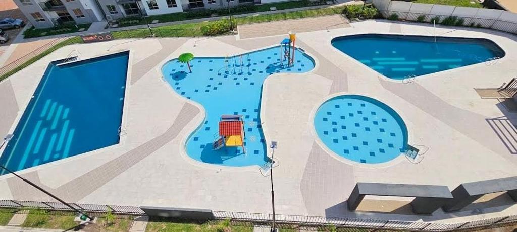Condominio AZUL RICAURTE Apartamento con 4 piscinas - 1