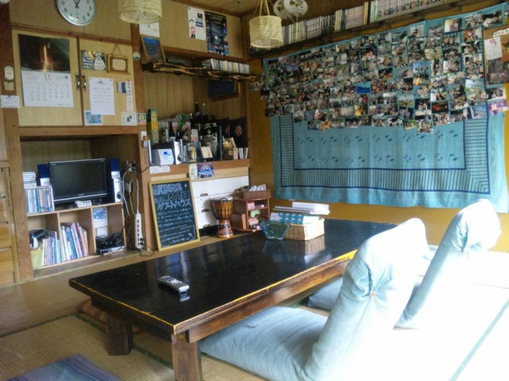 Shared lounge/TV area, Okinawa Motobu Guest House in Okinawa Main island