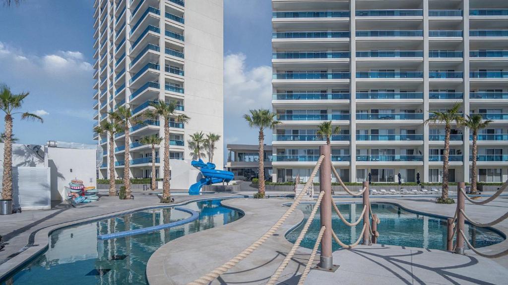 Panoramic water front deluxe condo Encantame Viento 605 - 1