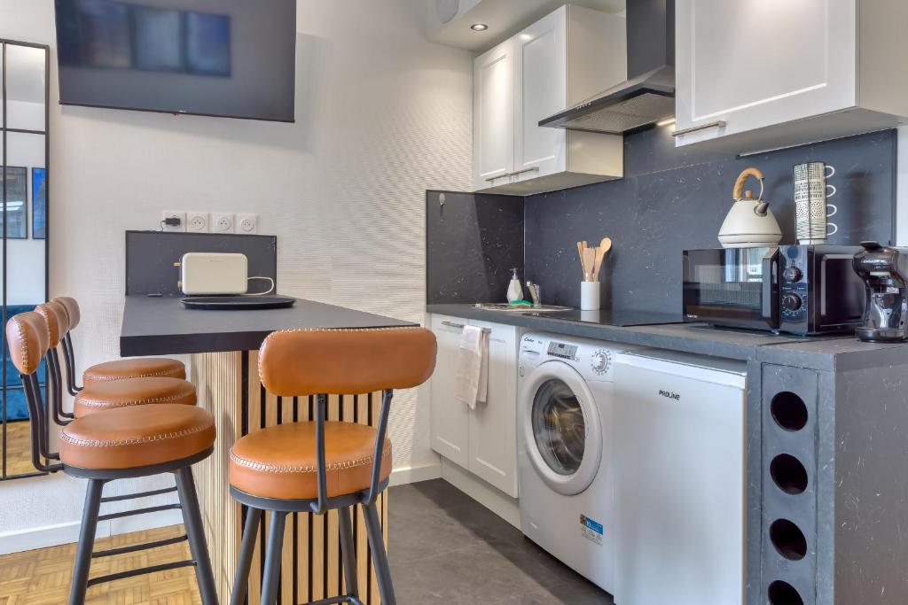 Kitchen or bedroom view of Cecile Charming Apartment