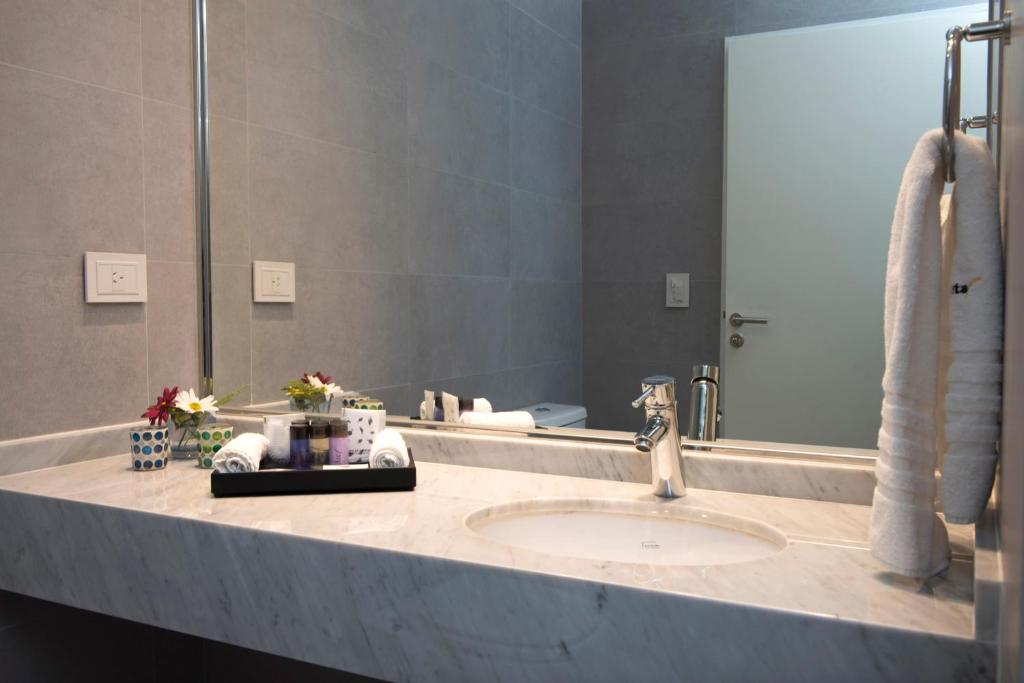 ARC Arenales Studios & Suites photo