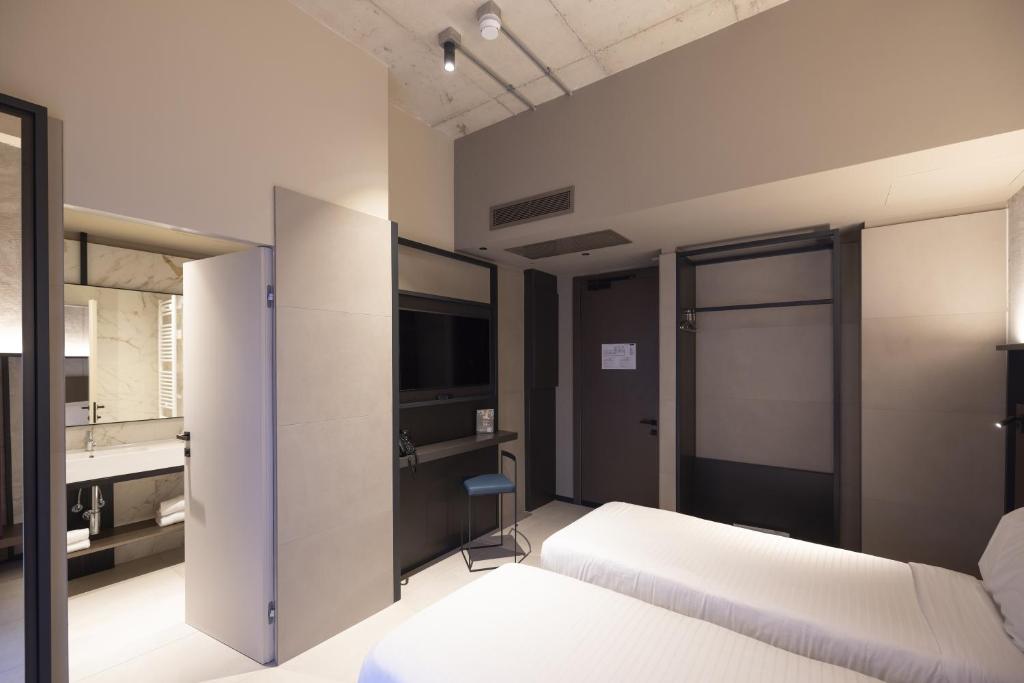 Joy 124 Hotel Milano — Pokoje in Mediolan, Lombardia