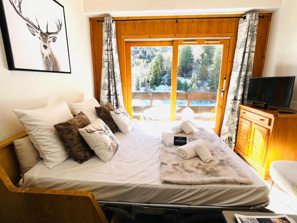 Duplex ski aux pieds 4 pers avec parking à Méribel - FR-1-688-102 - 3