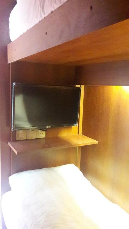 Twin Capsule with Shared Bathroom