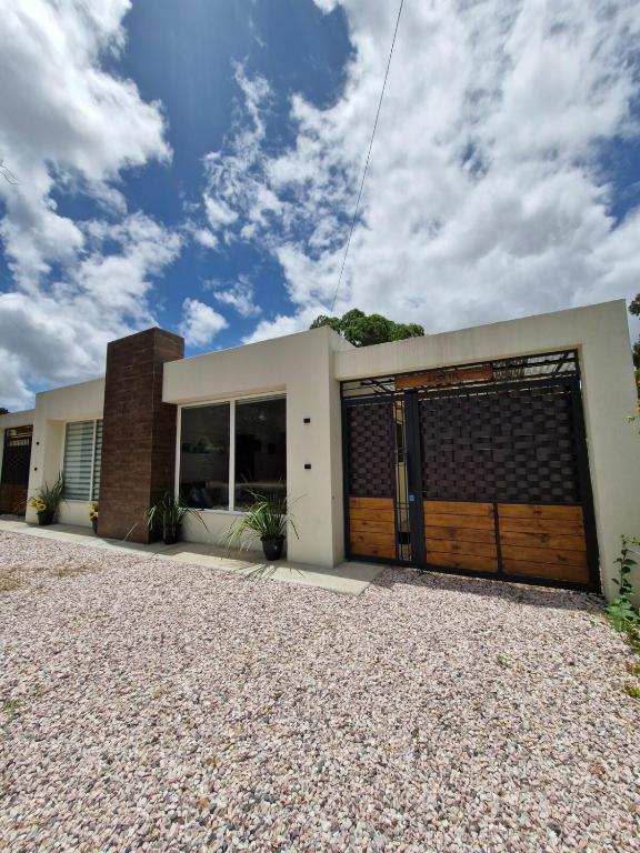 Hermosa casa a estrenar en Playa Grande ELIXIR - 2