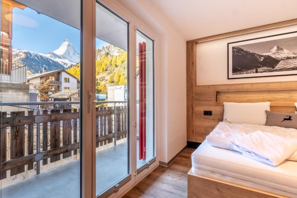 Studio Enzian - Matterhorn Sicht bei der Bergbahn Inspiringplaceszermatt - 1