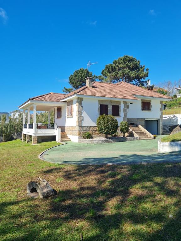 Chalet en Sanxenxo, en playa Canelas - 2