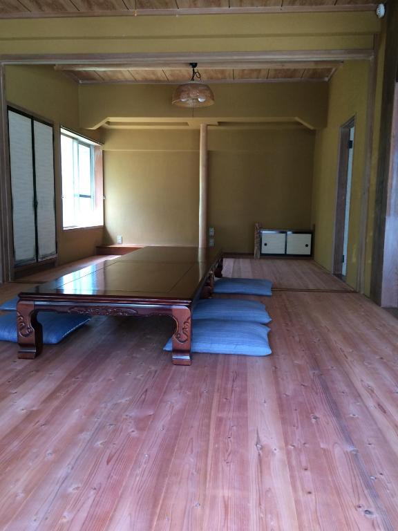 Shared lounge/TV area, Guest House Itokawa in Izu