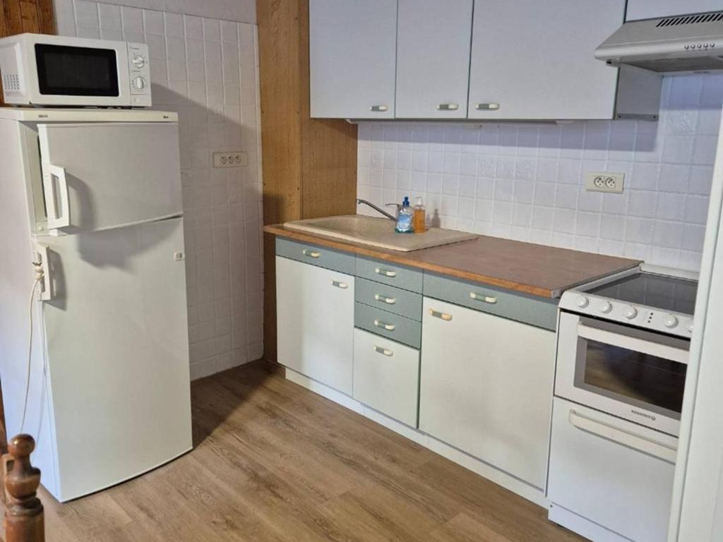 Appartement T4 de 68 m² avec terrasse et casier à ski - FR-1-234-344 - 1