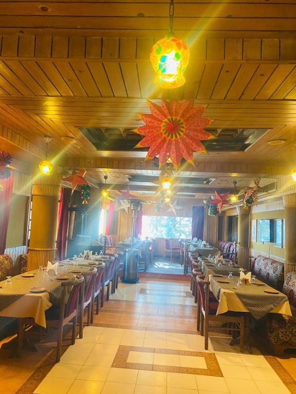 Restaurant, Snow King Retreat & Revolving Restaurant ,Cottages, Huts, Villas - Fagu Hill Top Kufri Shimla in Shimla