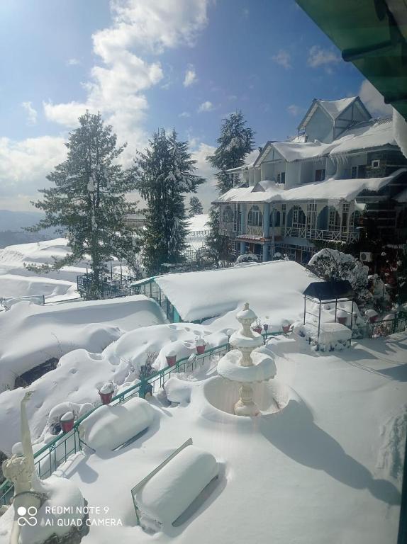 View, Snow King Retreat & Revolving Restaurant ,Cottages, Huts, Villas - Fagu Hill Top Kufri Shimla in Shimla