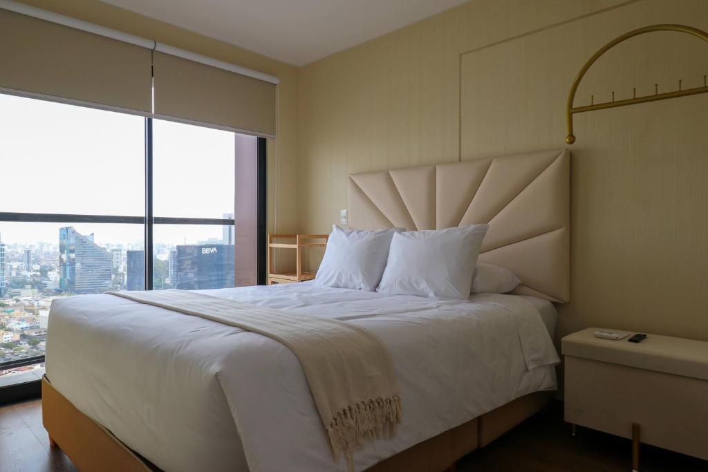 Stunning 2BR with Balcony & City Views - 2