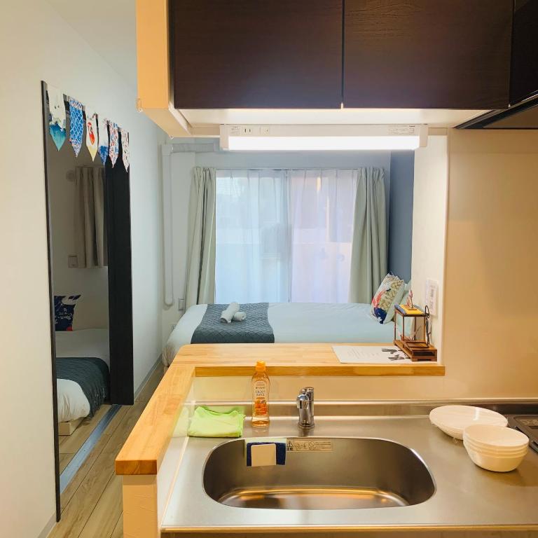 Apartment Hotel TIME Osaka Namba Tengachaya