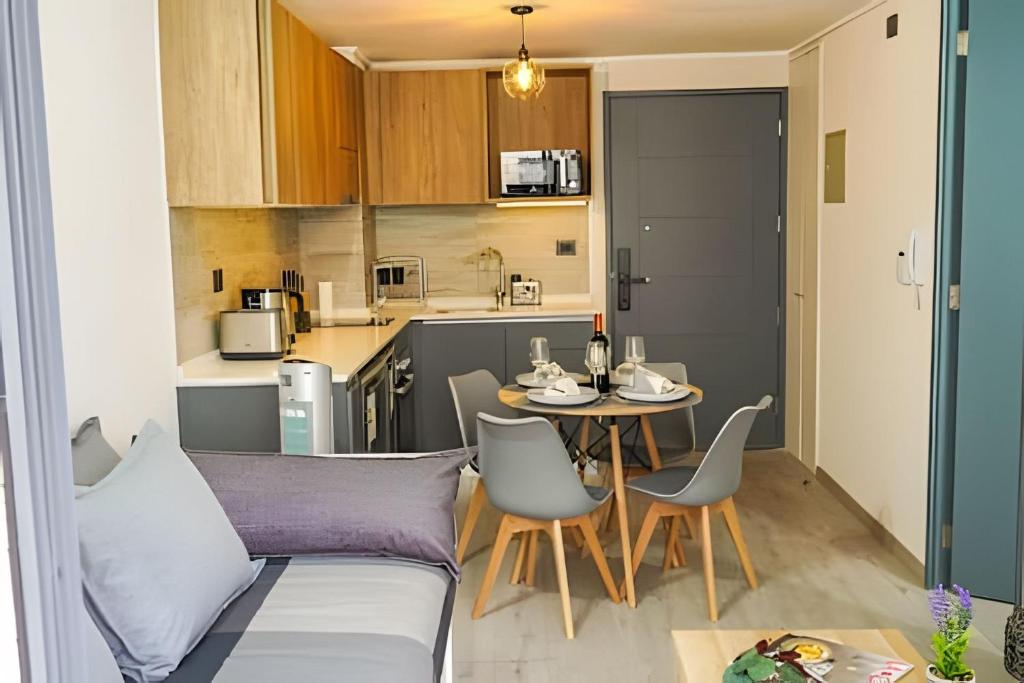 Modern Apartment with Terrace | Steps from Movistar Arena & Barrio Universitario | Up to 4 Guests - 1