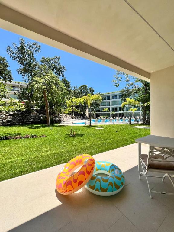Luxurious Condo with Poolside Patio - 1